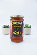 Brazilian Pepper Honey - Robust raw honey with warm, peppery notes